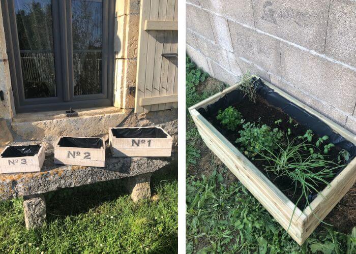 Garden boxes with herbs in a French garden