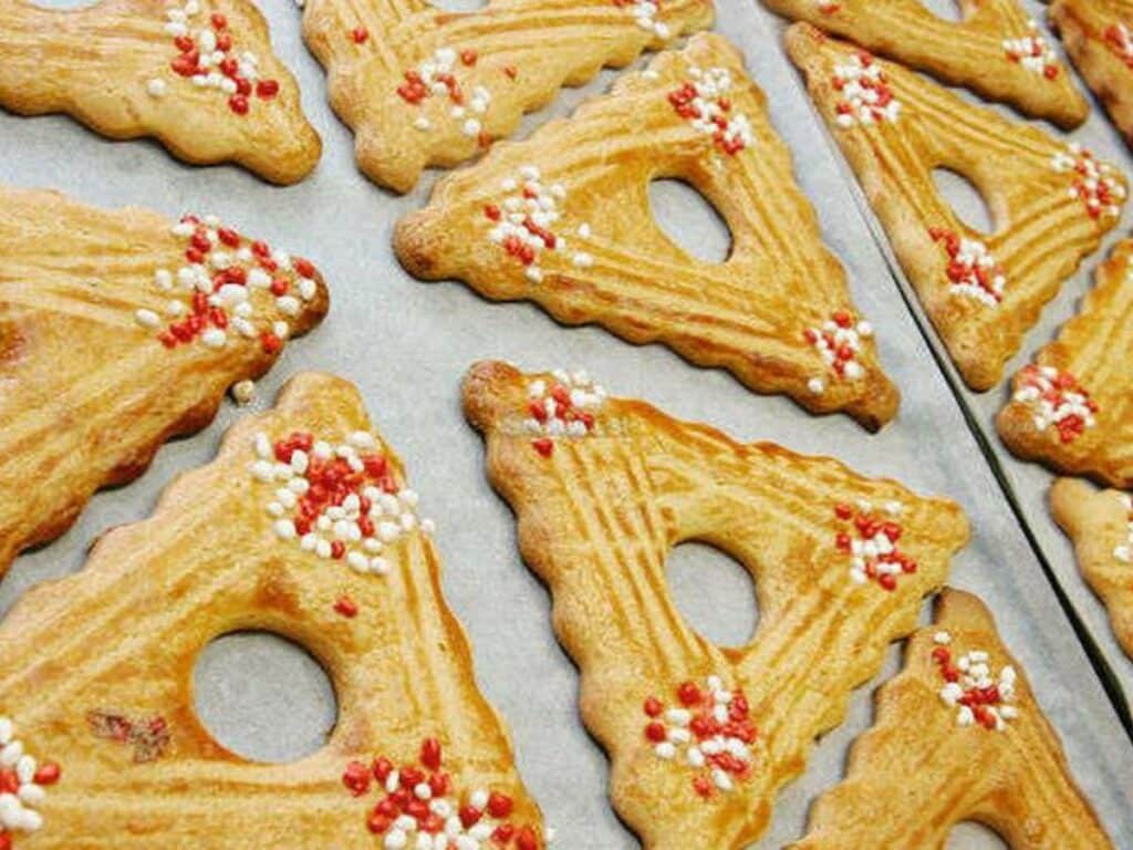 Triangular biscuits called Cornuelles