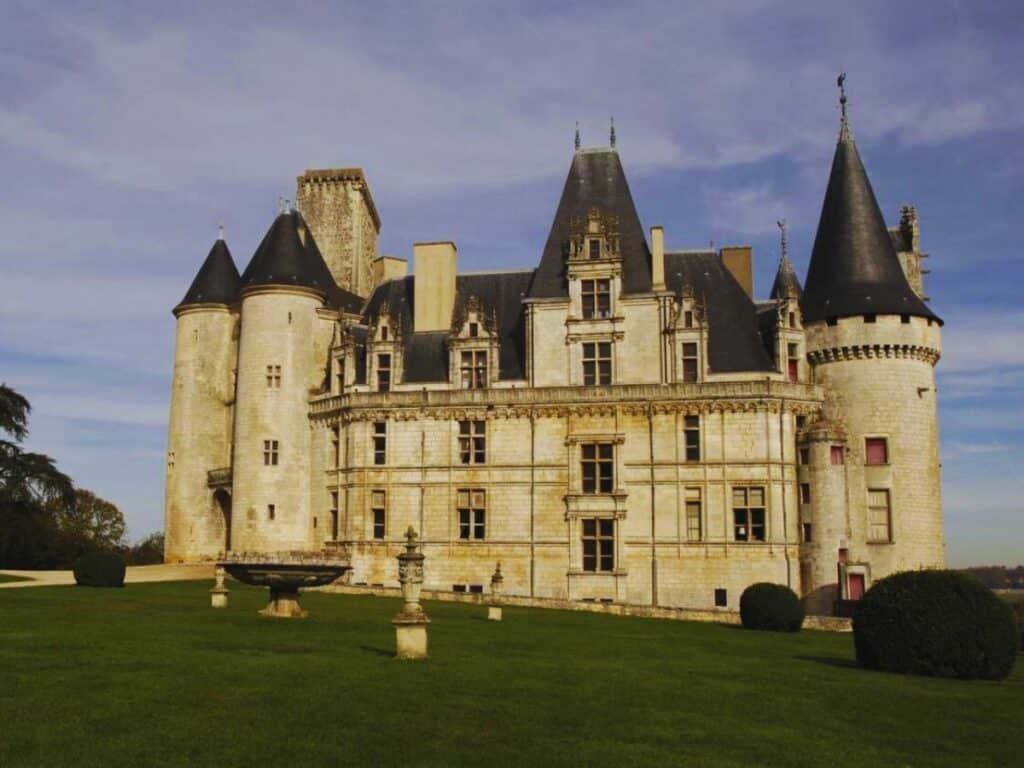 An old castle with lots of towers in the town of La Rochefoucauld