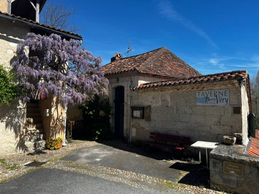 The exterior of a restaurant with lavendar in Aubeterre-sur-Dronne