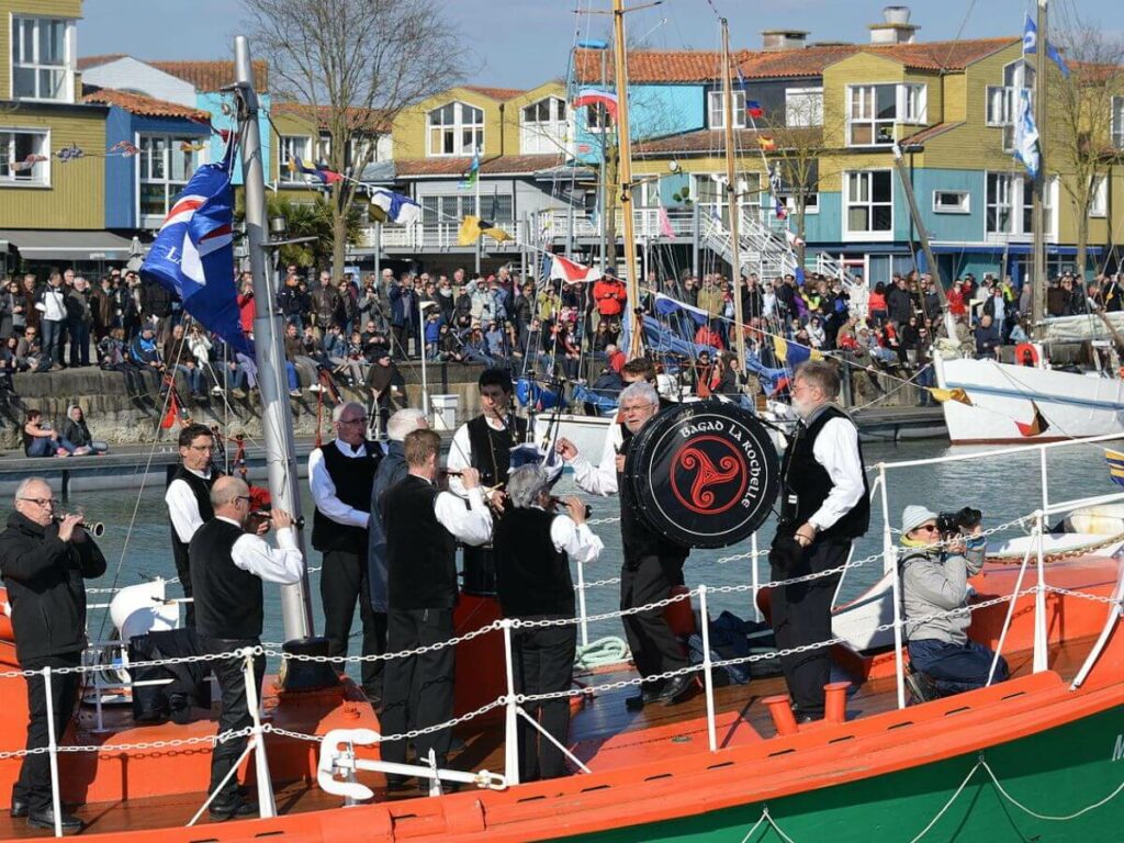 People in La Rochelle celebrating the Fete de la musique in France on a boat