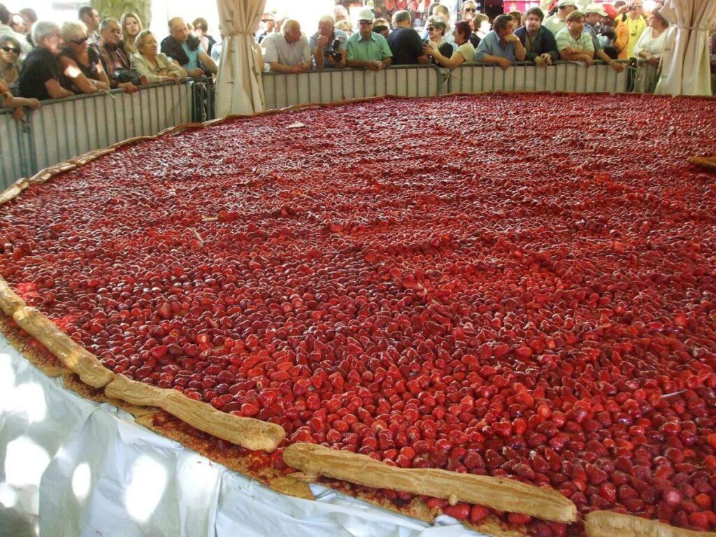 A giant strawberry pie from the strawberry festival in France