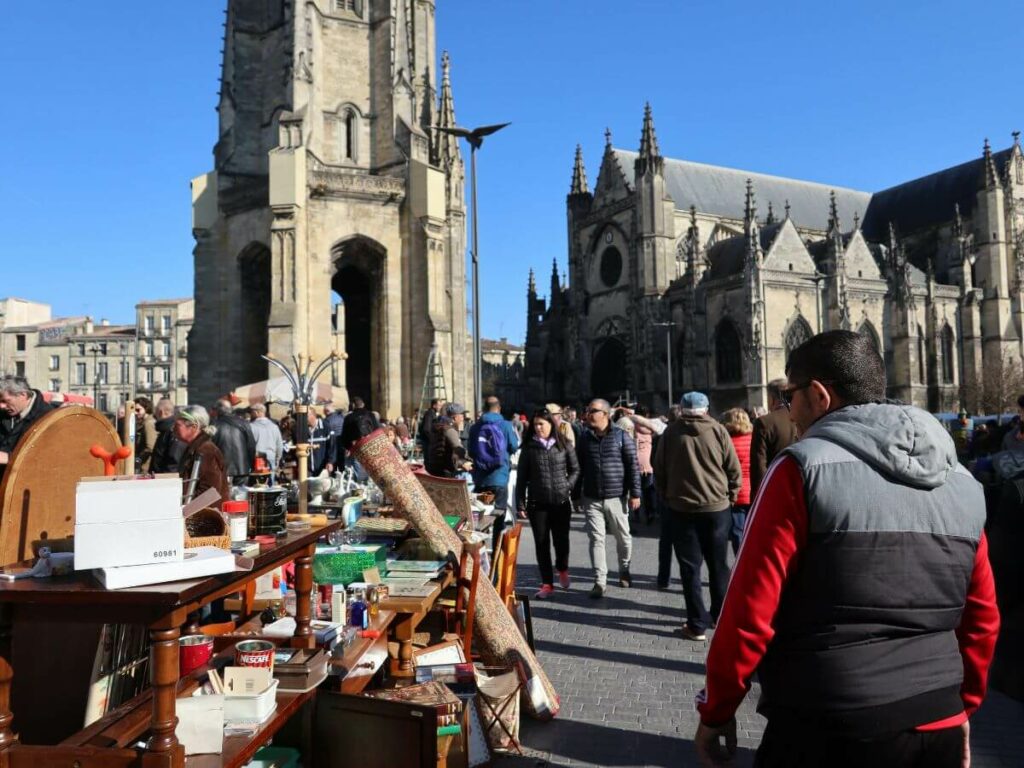 A market square in Bordeaux with a cathedral as the central point