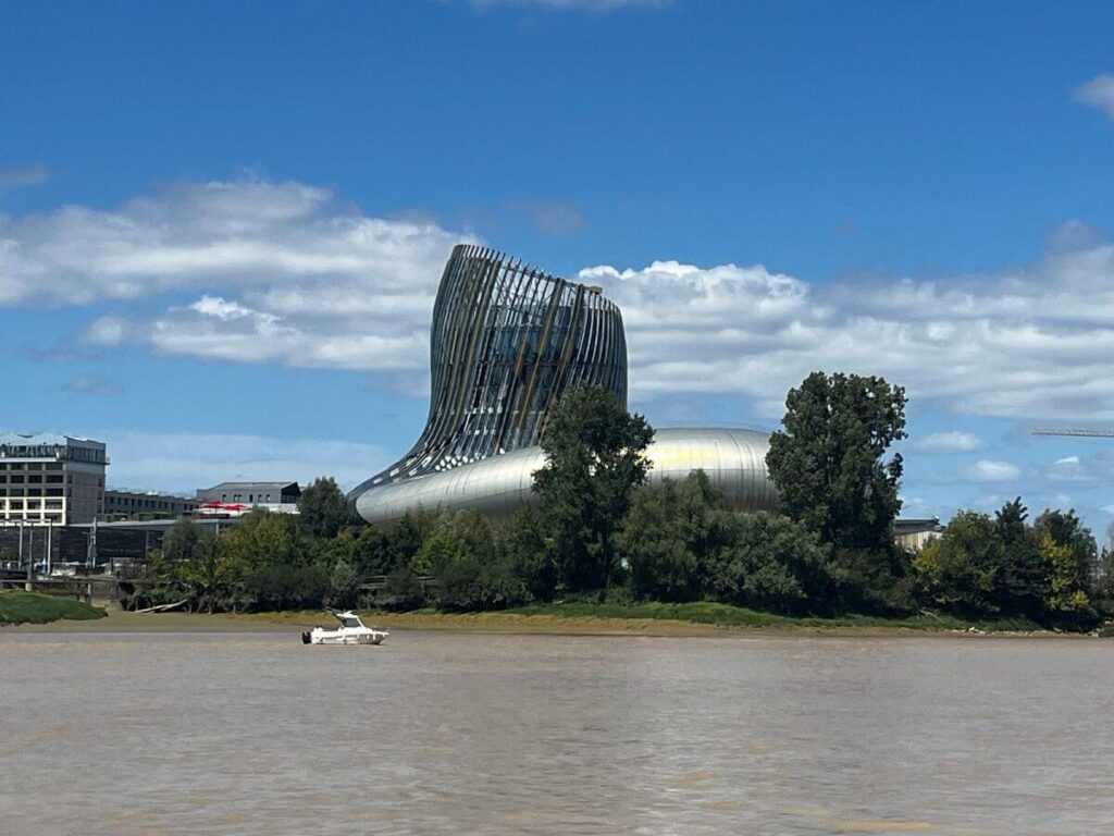 A silver architecturally designed building sitting on the banks of the river Gironde in Bordeaux