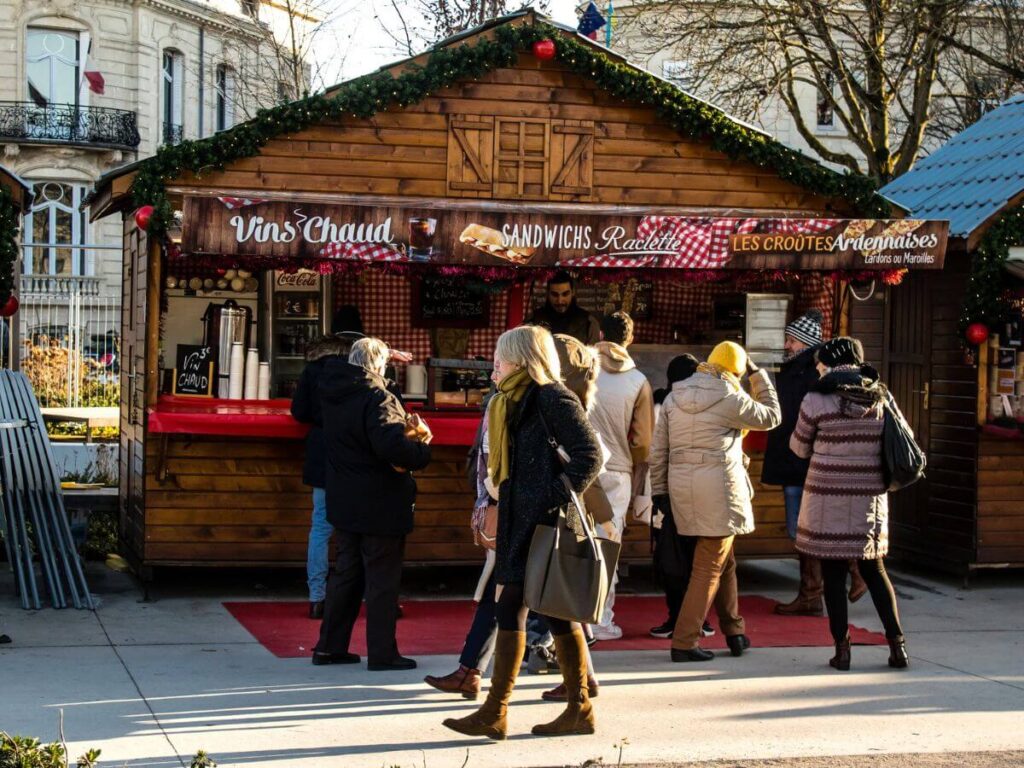 A wooden chalet selling mulled wine at the Reims Christmas Market