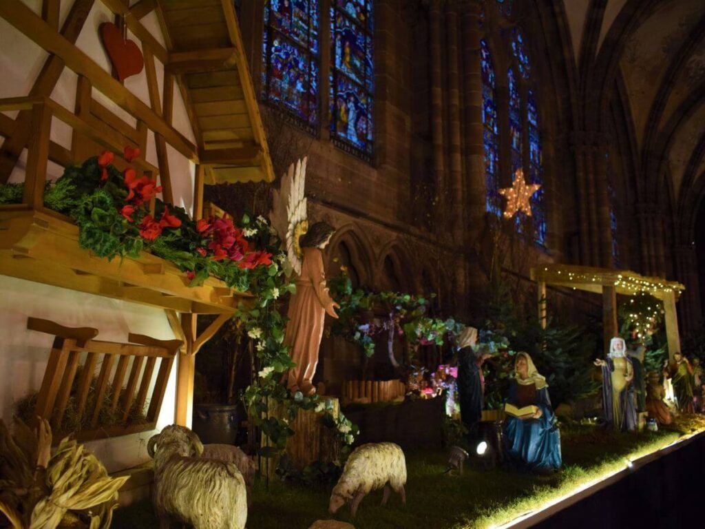 Nativity scene at night in a church at Christmas
