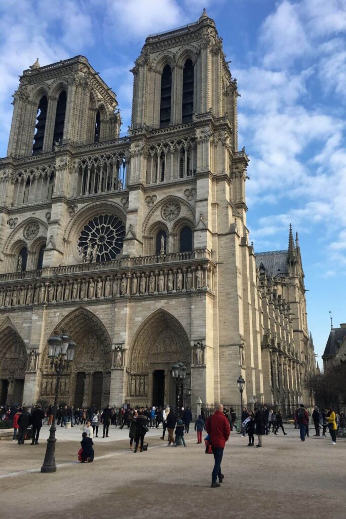 The outside of the NOtre Dame in Paris before it had the fire
