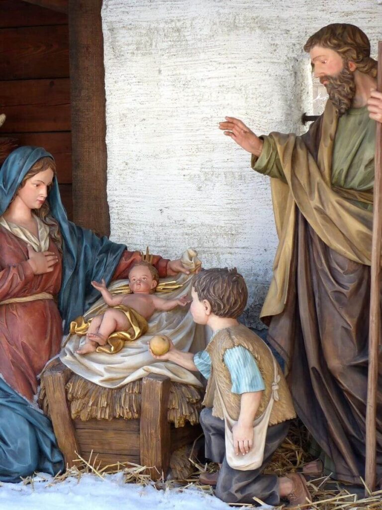 May and Joseph with the baby Jesus in a Crib as life size statues