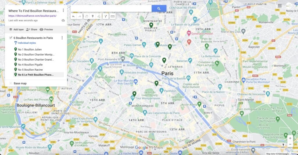 Map showing the locations of six Bouillon restaurants in Paris, marked with green pins. The listed restaurants include Bouillon Julien, Bouillon Chartier Montparnasse, Bouillon Chartier Grands Boulevards, Bouillon Pigalle, Bouillon Racine, and Le Petit Bouillon Pharamond. The map features various Paris landmarks and arrondissements, with notable areas such as Montmartre, the Louvre, and the Eiffel Tower.