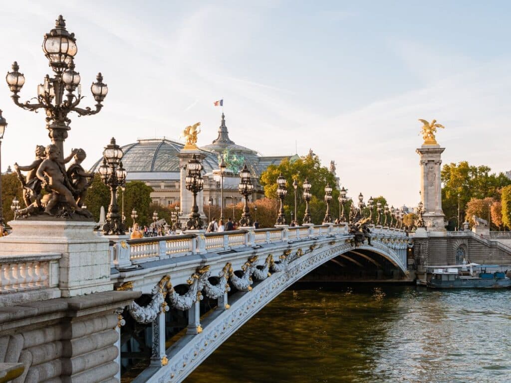 Golden hour over the Alexandre III Bridge in Paris.