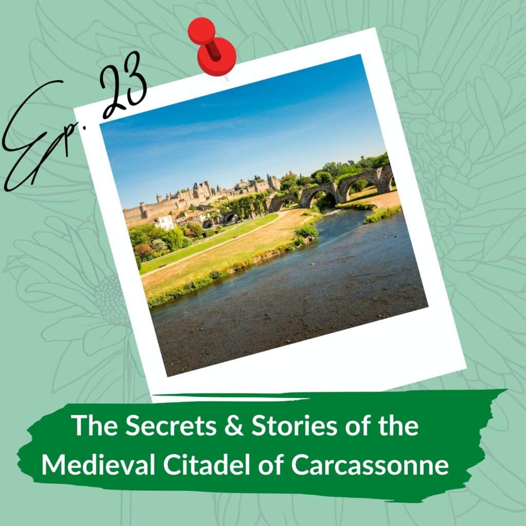 A scenic view of the medieval citadel of Carcassonne under a bright blue sky, with its historic stone bridge and lush greenery along a river in the foreground. Overlay text reads "Ep. 23" in a handwritten style and "The Secrets & Stories of the Medieval Citadel of Carcassonne" on a green background at the bottom.