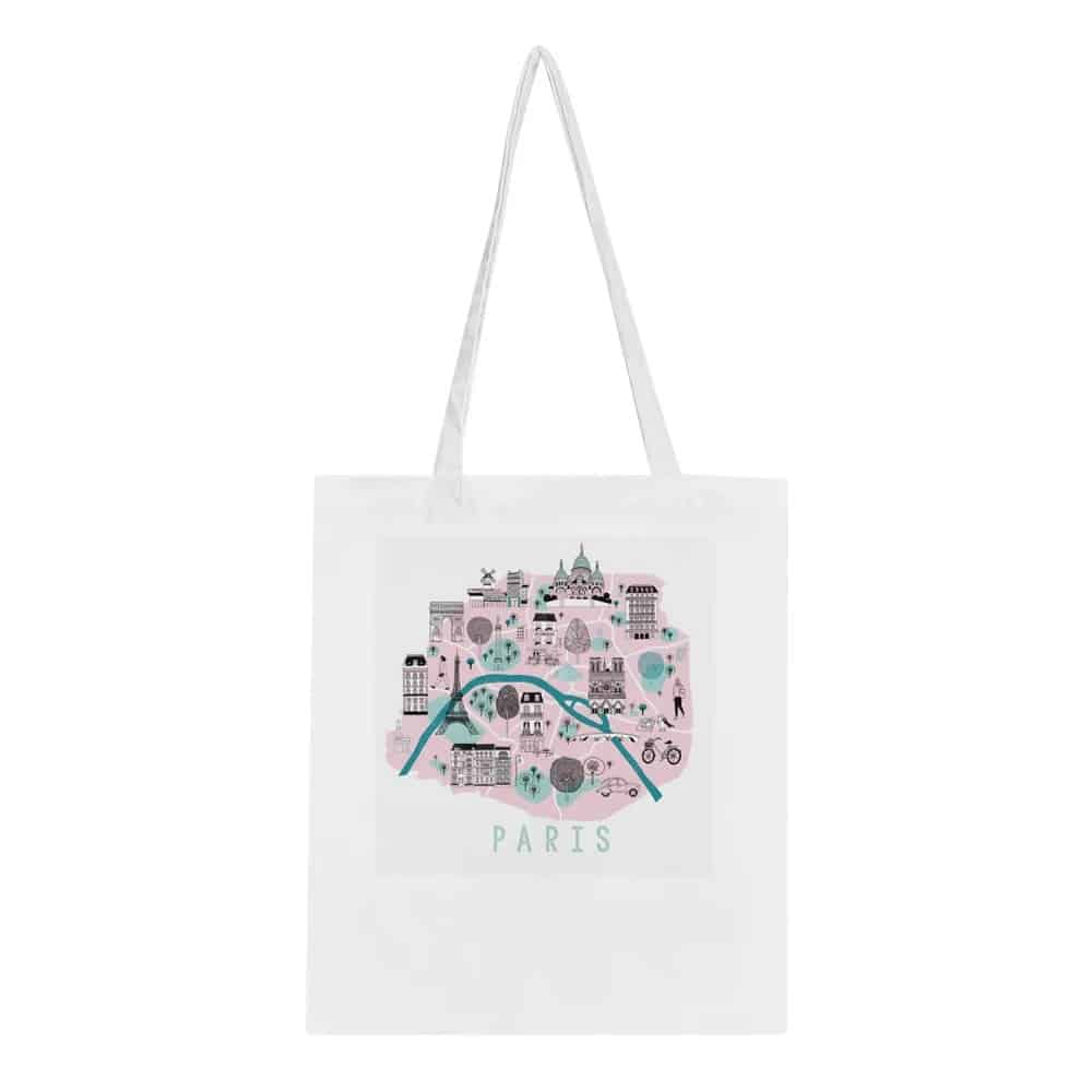 A third white tote bag showcases a playful map-style illustration of Paris, highlighting iconic attractions, the Seine River, and various Parisian landmarks in pastel shades, with the word "Paris" below.