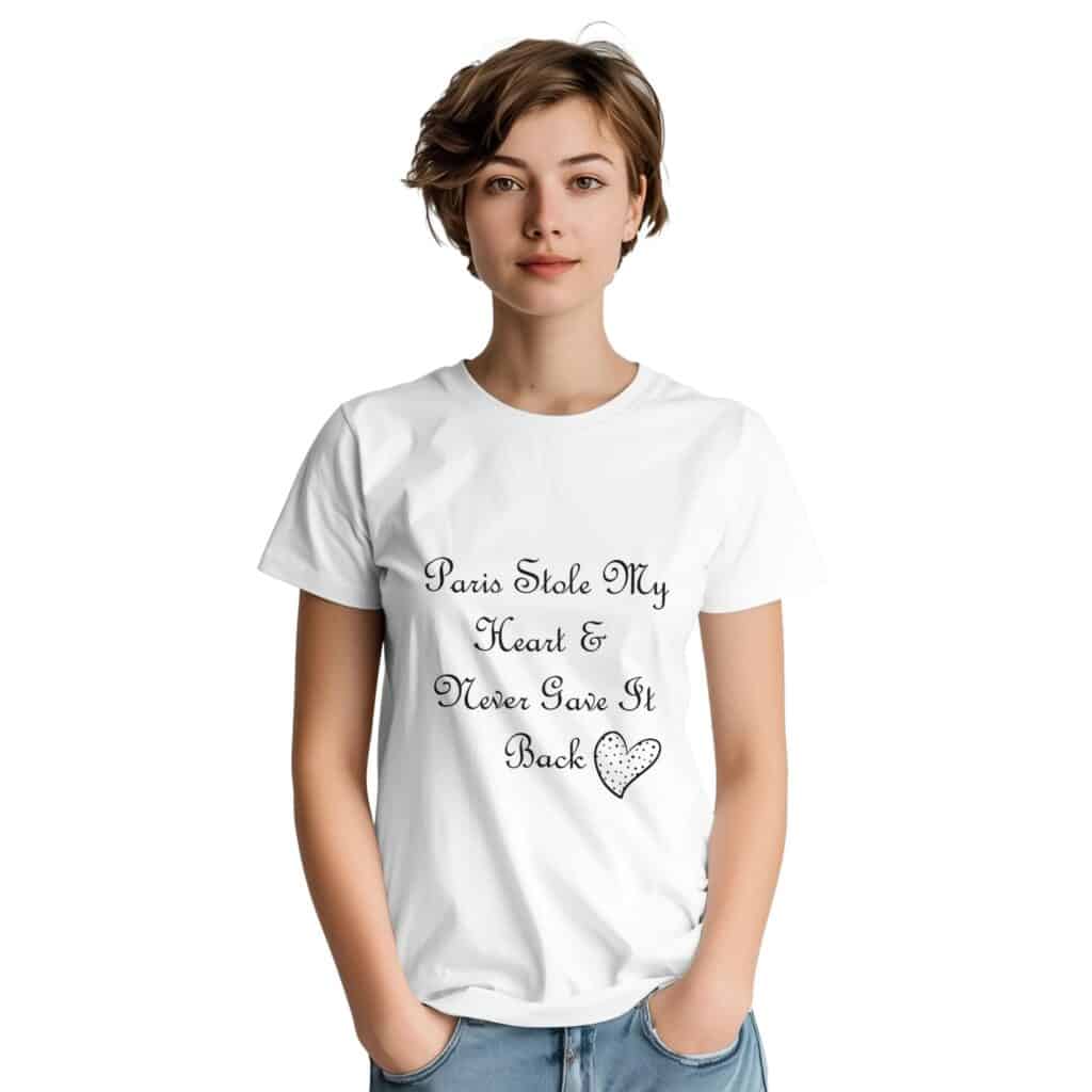 A white t-shirt with the sentimental text "Paris Stole My Heart & Never Gave It Back," completed with a dotted heart design, capturing the romance associated with Paris.