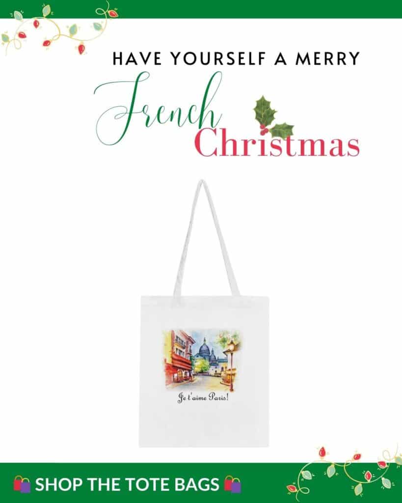 A tote bag with a vibrant scene of Montmartre, showcasing iconic Parisian architecture, and adorned with the message "Have Yourself a Merry French Christmas" in a festive layout.