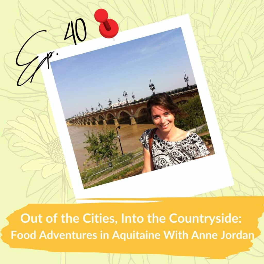 Podcast episode graphic for 'Ep. 40: Out of the Cities, Into the Countryside: Food Adventures in Aquitaine With Anne Jordan.' The image shows a smiling woman standing in front of a scenic bridge over a river in Aquitaine, under a clear blue sky. The design features a pin icon and floral illustrations in the background.