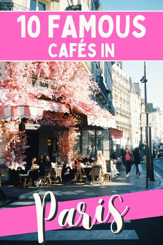 A vibrant Parisian café with pink cherry blossom decorations, outdoor seating, and a lively street view, showcasing an iconic café setting in Paris.