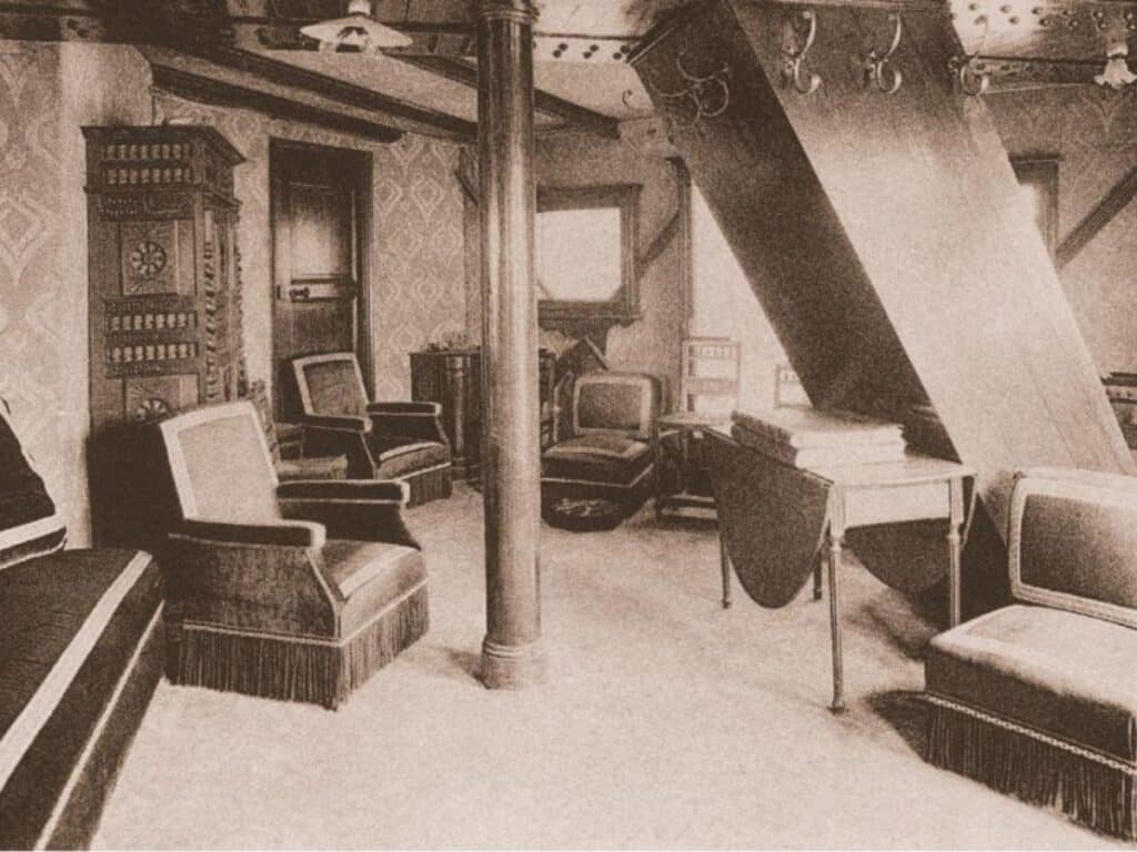 A glimpse inside Gustave Eiffel's private Eiffel Tower Apartment, with wax figures depicting a historical meeting in the richly decorated space.