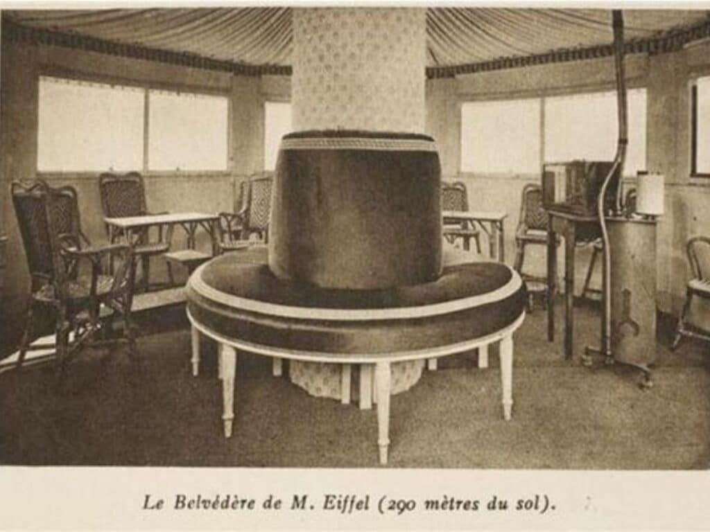A rare photograph of the Eiffel Tower’s summit, highlighting the exclusive Eiffel Tower Apartment, built by Gustave Eiffel as a private retreat.