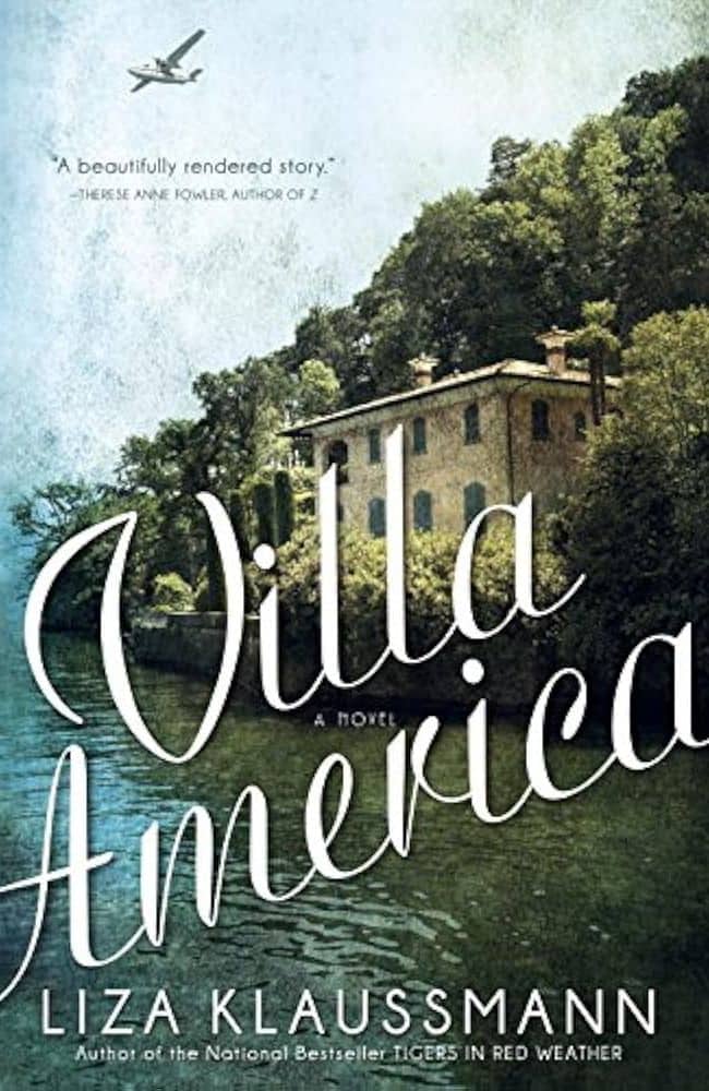 Villa America cover by Liza Klaussmann, showing a grand villa near a sparkling coastline with a plane overhead—this novel adds historical allure to the collection of summer beach reads set in France.