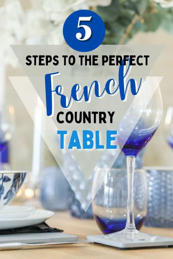 Graphic with overlaid text reading “5 Steps to the Perfect French Country Table,” featuring elegant blue stemware, floral dishware, and a softly lit tablescape in the background.